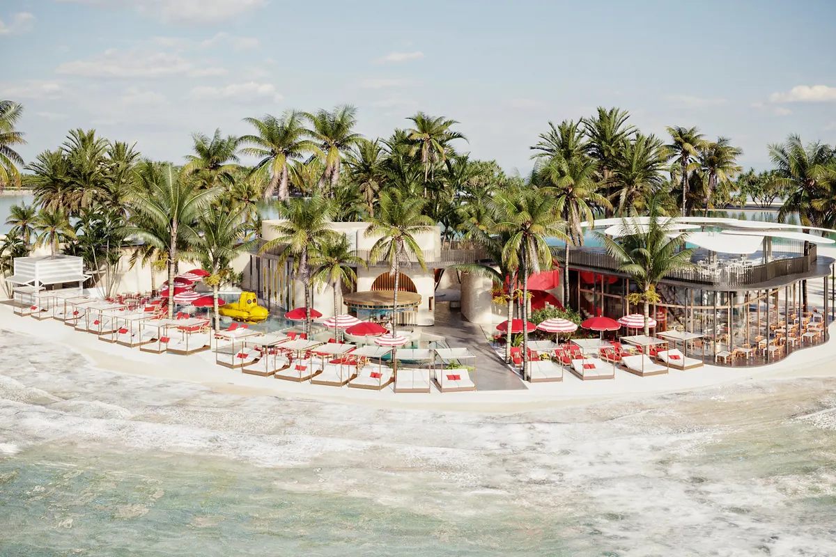 Render de Calypso Beach Club visto desde el mar, con palmeras y sombrillas sobre la arena